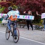Gary Locke, a QFC worker for 11 years well known for his friendly service, is honored as a frontline hero in a nightly parade on 53rd Avenue West in Mukilteo. (Kevin Clark / The Herald)