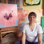 Kimberly Mattson paints out of a studio at her Everett home, where she hung all the paintings that were intended for exhibits that were canceled because of the pandemic. (Joshua Mattson)