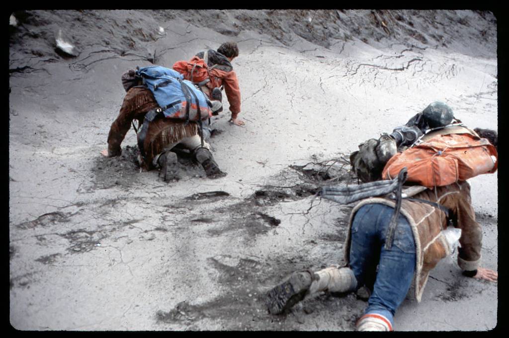 Michael Lienau and others in his film crew struggle through the ash just days after the May 18, 1980, eruption of Mount St. Helens. (Russell Johnson photo)
