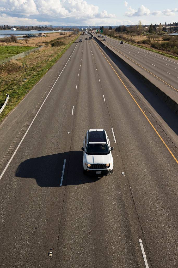 A car has plenty of room as it heads north on I-5 in Everett. (Andy Bronson / The Herald)