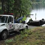 A Ford Taurus was pulled from the muddy depths of Goss Lake on May 21. (Whidbey News-Times)