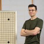 Game designer Nick Sibicky of Lynnwood, seen here next to a Go board, recommends eight board games to play during the quarantine. (Brian K. Allen)