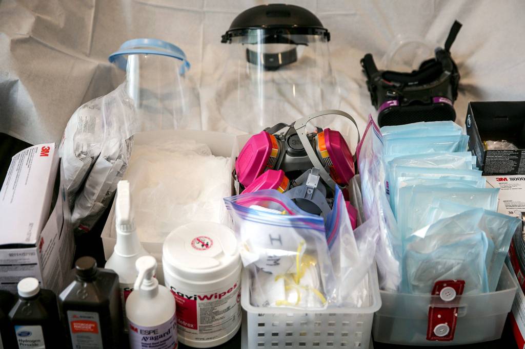 Personal protective equipment at the dental office of Amy Norman in Everett. (Kevin Clark / The Herald)