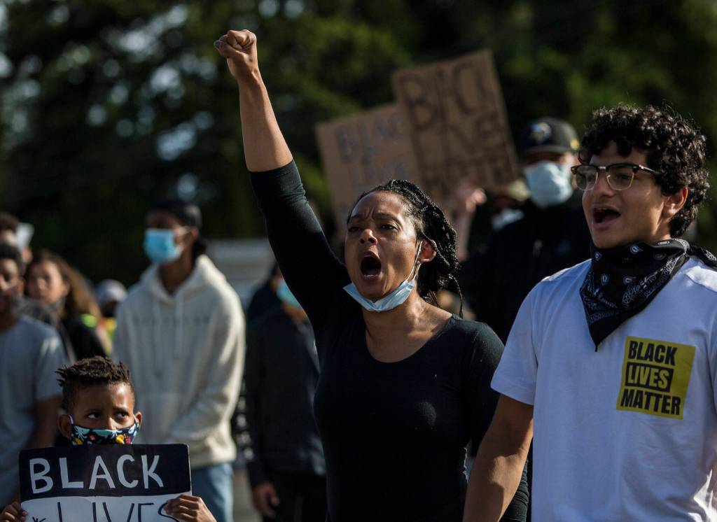 Hazzauna Underwood leads the crowd in a chant during the Black Lives Matter protest on Sunday in Mukilteo. (Olivia Vanni / The Herald)