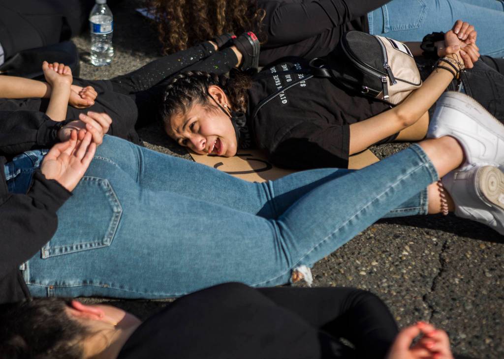 Marisol Hernandez chants Mamma Im scared as protesters lay on Mukilteo Speedway during the Black Lives Matter protest on Sunday in Mukilteo. (Olivia Vanni / The Herald)