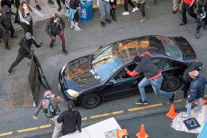Man shot in Seattle after gunman drives car into protesters