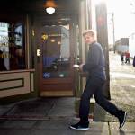 Celebrity chef Gordon Ramsay hurriedly walks into the Prohibition Grille on Dec. 5, 2012 while filming an episode of Kitchen Nightmares to makeover the struggling downtown Everett restaurant. (Mark Mulligan / Herald file)