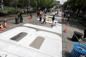 Trump fumes, threatens over festive protest zone in Seattle