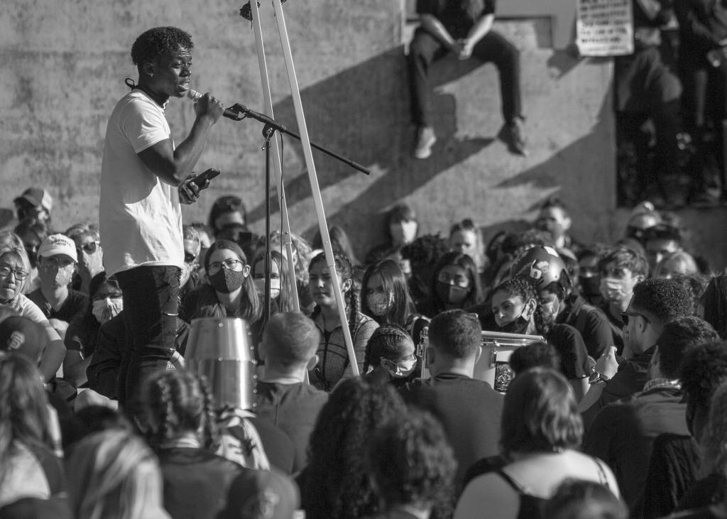 Josh Binda speaks to a crowd of protesters during the Black Lives Matter march on June 7 in Mukilteo. (Olivia Vanni / The Herald)