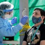 In this May 15 photo, Tina Nguyen (left), a nurse at at the International Community Health Services clinic in Seattles International District, takes a nose swab sample from David Carroll, an ICHS employee, during walk- and drive-up testing for COVID-19, in Seattle. (AP Photo/Ted S. Warren)