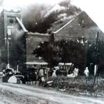 In this 1921 file image provided by the Greenwood Cultural Center via Tulsa World, Mount Zion Baptist Church burns after being torched by white mobs during the 1921 Tulsa massacre. (Greenwood Cultural Center via Tulsa World via AP)
