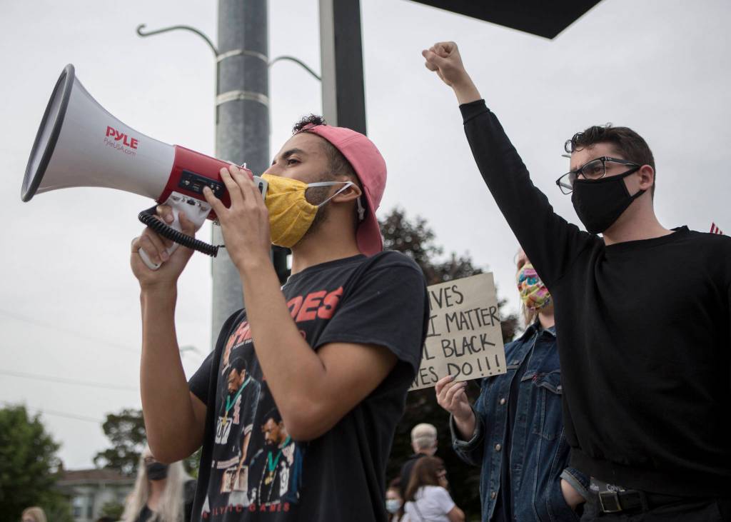 Drake Wilson leads protesters in a chant on Friday, June 19, 2020 in Snohomish, Wa. (Olivia Vanni / The Herald)