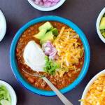 Lots of crunchy, sharp and creamy toppings turn a simple bowl of beef and bean chili into dinner in an instant. (Ben Mims / Los Angeles Times)
