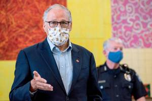 Inslee heckled off stage during Tri-Cities appearance