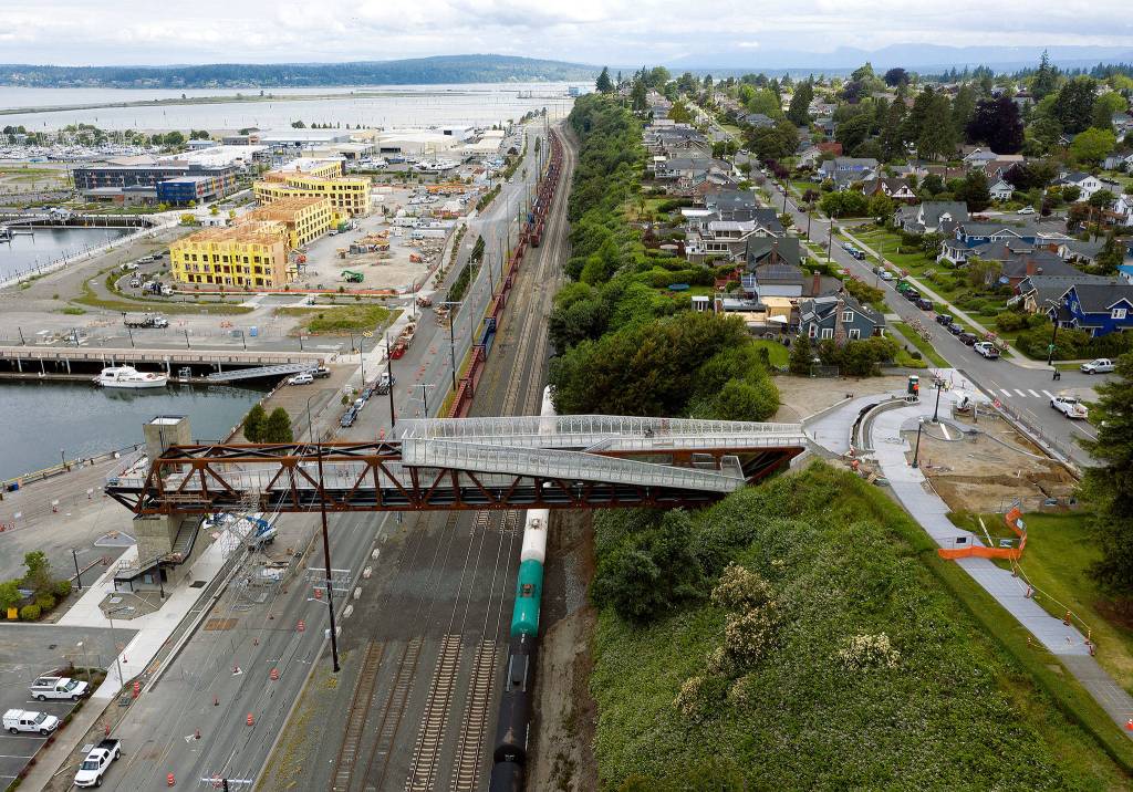 The Grand Avenue Park pedestrian and utility bridge, seen here still under construction, links residential north Everett with the waterfront. (Chuck Taylor / The Herald)