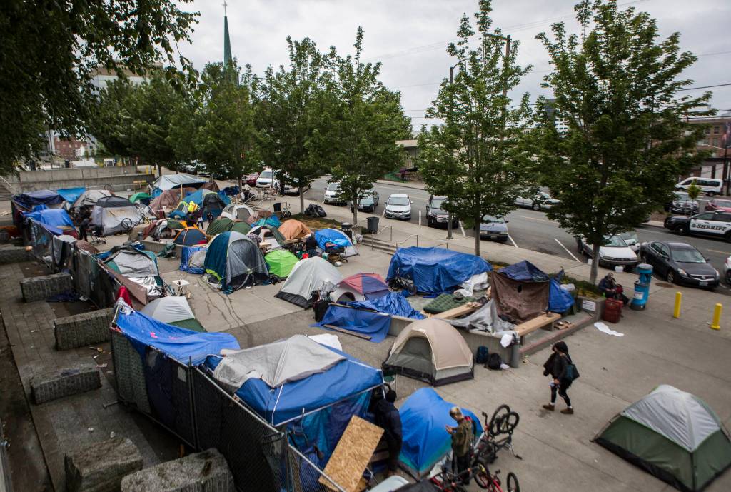 The homeless camp at the corner of Wall Street and Oakes Avenue on Thursday in Everett. (Olivia Vanni / The Herald)