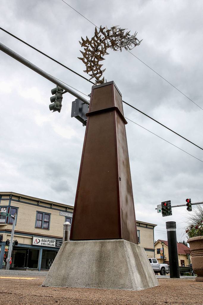 Kevin Pettelles Wagner Swifts sculpture stands at the corner of Main and Lewis streets in Monroe. (Kevin Clark / The Herald)