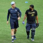 Rays pitcher Blake Snell (left), a Shorewood High School alum, talks with bullpen catcher Jean Ramirez during practice on July 3, 2020, in St. Petersburg, Fla. (AP Photo/Mike Carlson)