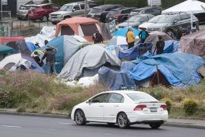 Downtown Everett homeless camp moves to Rucker Avenue lot