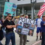 Supporters of law enforcement and first responders rally confront counter protesters Friday at the Snohomish County Plaza in Everett on July 17, 2020. (Kevin Clark / The Herald)