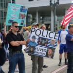 Supporters of law enforcement and first responders rally confront counter protesters Friday at the Snohomish County Plaza in Everett on July 17, 2020. (Kevin Clark / The Herald)