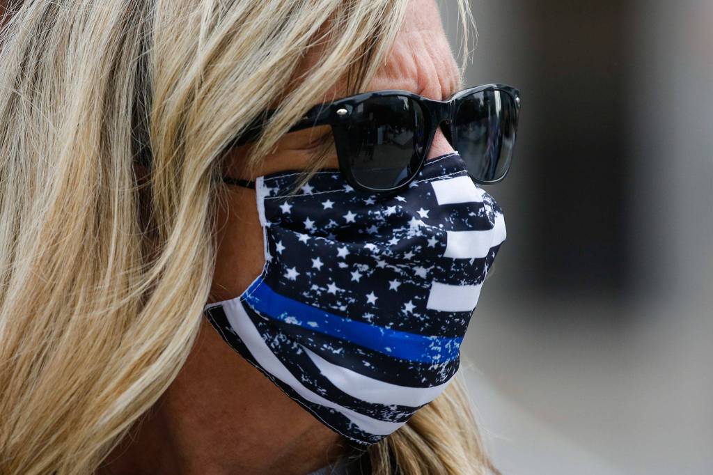 Rally to support to law enforcement and first responders sponsored by The Outreach Committee of the Snohomish County Republican Party Friday at the Snohomish County Plaza in Everett on July 17, 2020. (Kevin Clark / The Herald)