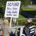 A protester attends the rally to support to law enforcement and first responders sponsored by The Outreach Committee of the Snohomish County Republican Party Friday at the Snohomish County Plaza in Everett on July 17, 2020. (Kevin Clark / The Herald)