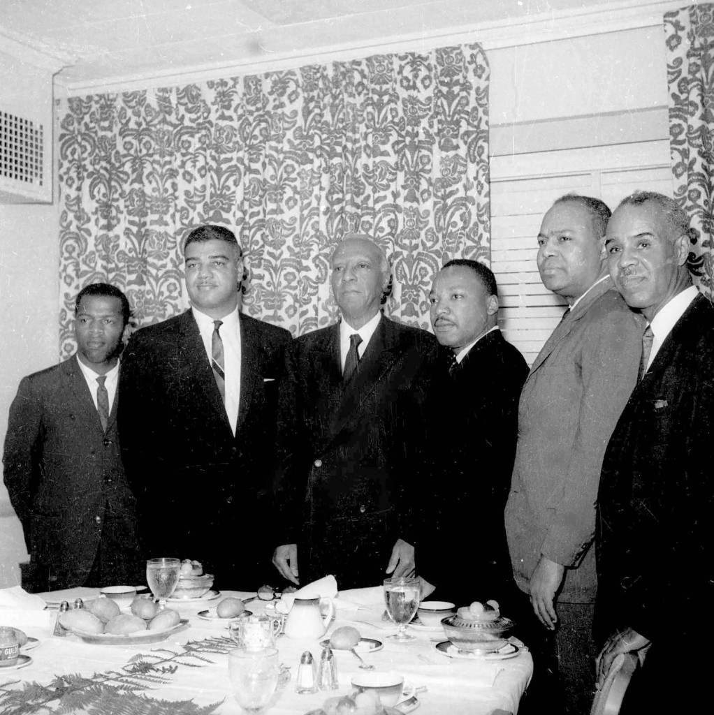 In this July 2, 1963 photo, six leaders of the nations largest black civil rights organizations pose at the Roosevelt Hotel in New York. From left, are: John Lewis, chairman Student Non-Violence Coordinating Committee; Whitney Young, national director, Urban League; A. Philip Randolph, president of the Negro American Labor Council; Martin Luther King Jr., president Southern Christian Leadership Conference; James Farmer, Congress of Racial Equality director; and Roy Wilkins, executive secretary, National Association for the Advancement of Colored People. (AP Photo/Harry Harris, File)