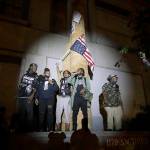 A group of demonstrators addresses the crowd during a Black Lives Matter protest at the Mark O. Hatfield U.S. Courthouse on Thursday in Portland. (AP Photo/Marcio Jose Sanchez)