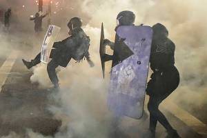 On Portland’s streets: Anger, fear, and a fence that divides