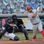 The Angels Albert Pujols watches his two-run home run as Mariners catcher Austin Nola looks on during the first inning of a game Aug. 4, 2020, in Seattle. (AP Photo/Ted S. Warren)