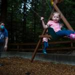 Ella Dunning, 3, is pushed on a swing Thursday by her dad, David Dunning, in Everett. Ella will start the online Early Childhood Education and Assistance Program in a few weeks. (Olivia Vanni / The Herald)