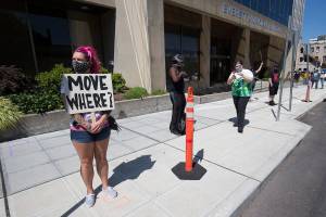Homeless people fenced out of small park in downtown Everett