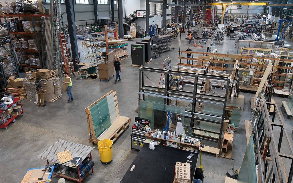 Windows and doors are assembled at the Goldfinch Brothers facility on Beverly Park Road in Everett. (Andy Bronson / The Herald)