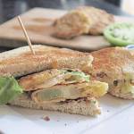 Fried green tomatoes stand in fro fresh red tomatoes in this BLT sandwich. (Gretchen McKay/Pittsburgh Post-Gazette/TNS)