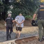 Police dog nabs, nips man suspected of burgling smoke shops