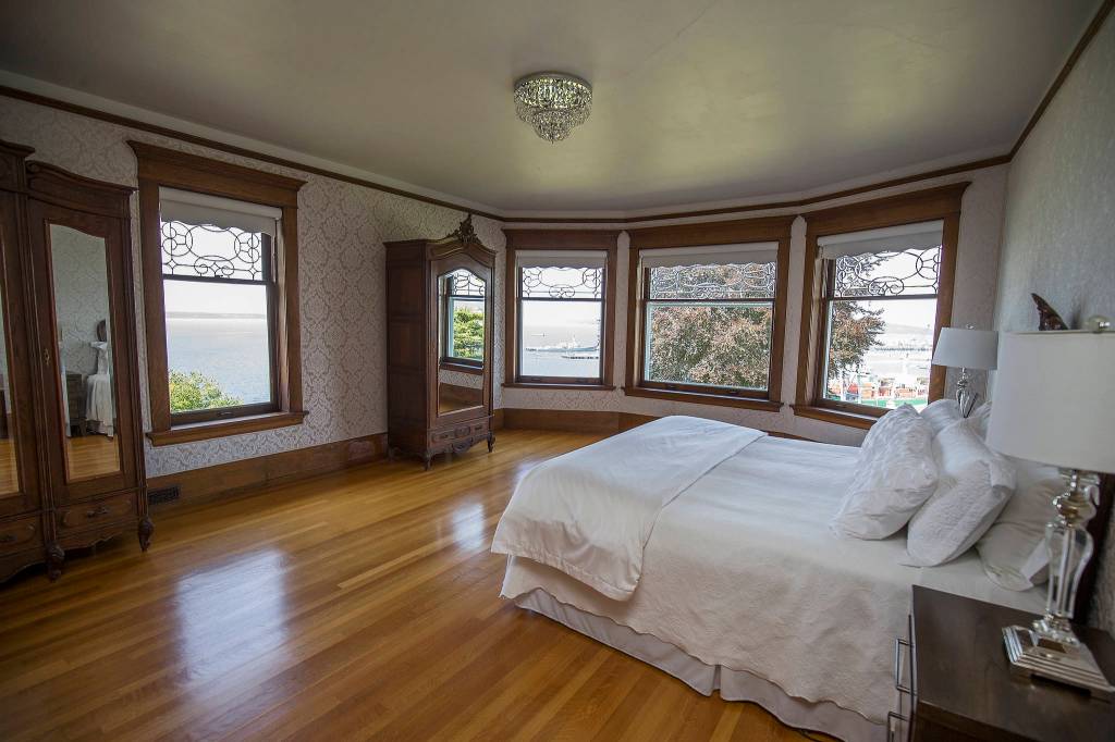 The Rucker Mansions main bedroom has views of the Olympic Mountains, Puget Sound and the Port of Everett. (Andy Bronson / The Herald)