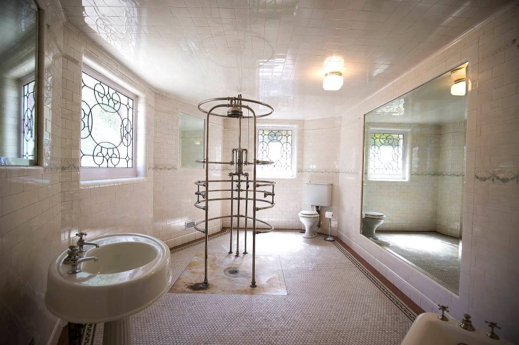 In the basement of the Rucker Mansion is a nickel-plated needle shower in the bathroom. (Andy Bronson / The Herald)
