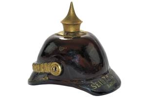 The bottle was described in the catalog as one of the most unusual figural bottles they had ever auctioned. It was made about 1890. Seidel C. / Hoflieferanten / Breslau is on the base. Auction price with premium, $780. (Cowles Syndicate Inc.)