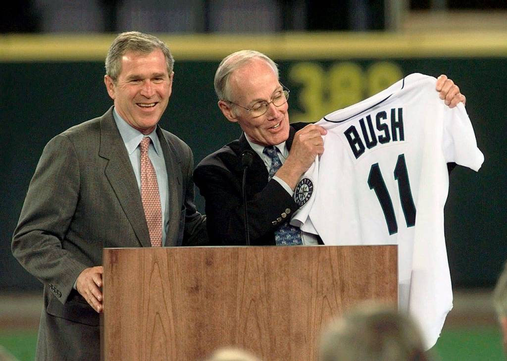 Then-Texas Gov. George W. Bush (left) with Sen. Slade Gorton at a Safeco Field fundraiser in Seattle in 1999. Bush was running for president. (AP Photo/Elaine Thompson)