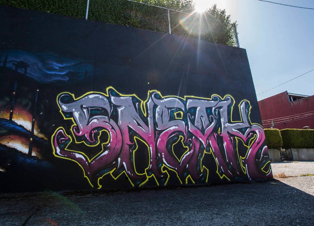 Detail of graffiti art along Grand Avenue alley on Wednesday in Everett. (Olivia Vanni / The Herald)