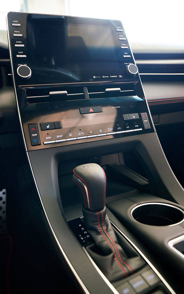 An 8-inch touchscreen infotainment system in the Avalon TRD includes four USB charge ports, SiriusXM radio, and Apple CarPlay capability. Wireless charging is also standard. (Toyota)