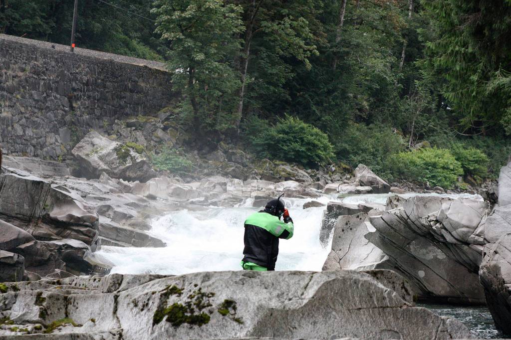 Sheriffs search and rescue Sgt. Sanders gets ready to go into the water at Eagle Falls on Aug. 8, 2020. (Zachariah Bryan / The Herald)