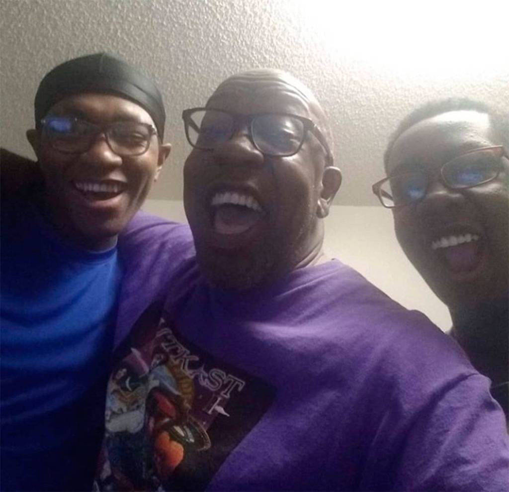 Devin Shelby (left) with his father Marvin Shelby (center) and brother Davionne Shelby. (Family photo)
