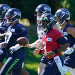 Seahawks quarterback Russell Wilson (3) warms up during the final day of training camp on Sept. 3, 2020, in Renton. (AP Photo/Ted S. Warren)