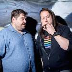 Mitch Burrow (left) and Tyler Smith smoke marijuana before performing for The Dope Show. The next one is scheduled for Nov. 20 at the Historic Everett Theatre. (Gabriel Michael)