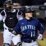 The Mariners Evan White (12) walks to the dugout after striking out during the ninth inning of a game against the Diamondbacks on Sept. 11, 2020, in Phoenix. (AP Photo/Matt York)