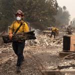 Death tolls climb on West Coast as large wildfires continue