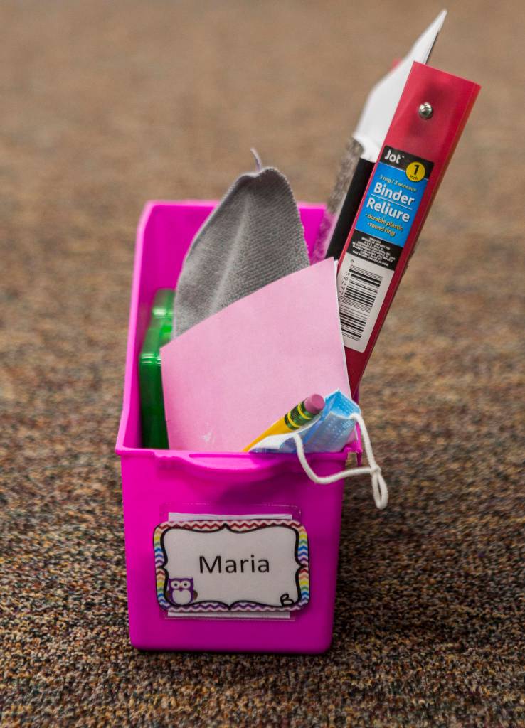 A handful of school supplies and a mask for a student on Thursday in Stanwood. (Olivia Vanni / The Herald)
