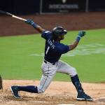 The Mariners Kyle Lewis (1) hits a solo home run during the fifth inning of a game against the Padres on Sept. 19, 2020, in San Diego. (AP Photo/Denis Poroy)